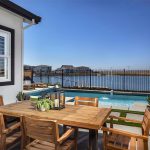 Kiper_SkyeAtRiverIslands_Res2-Patio_7999c-11x8_geo