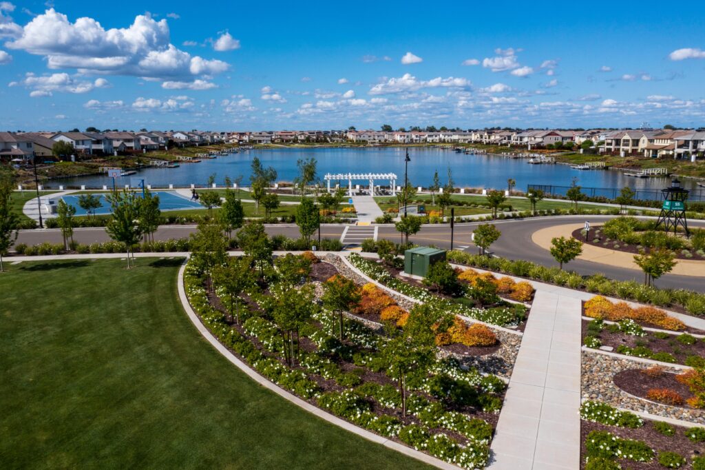 sunny lakeside summer house park with basketball court and walking paths
